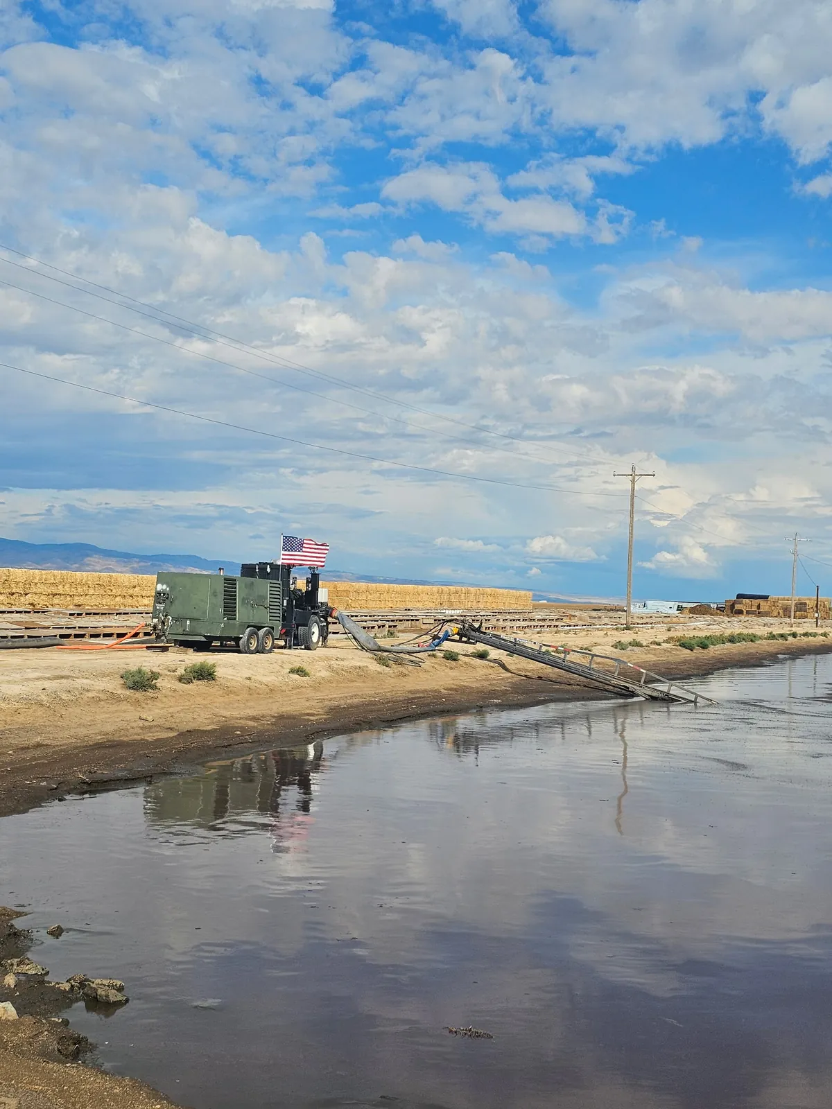 Pump and generator set alongside a canal